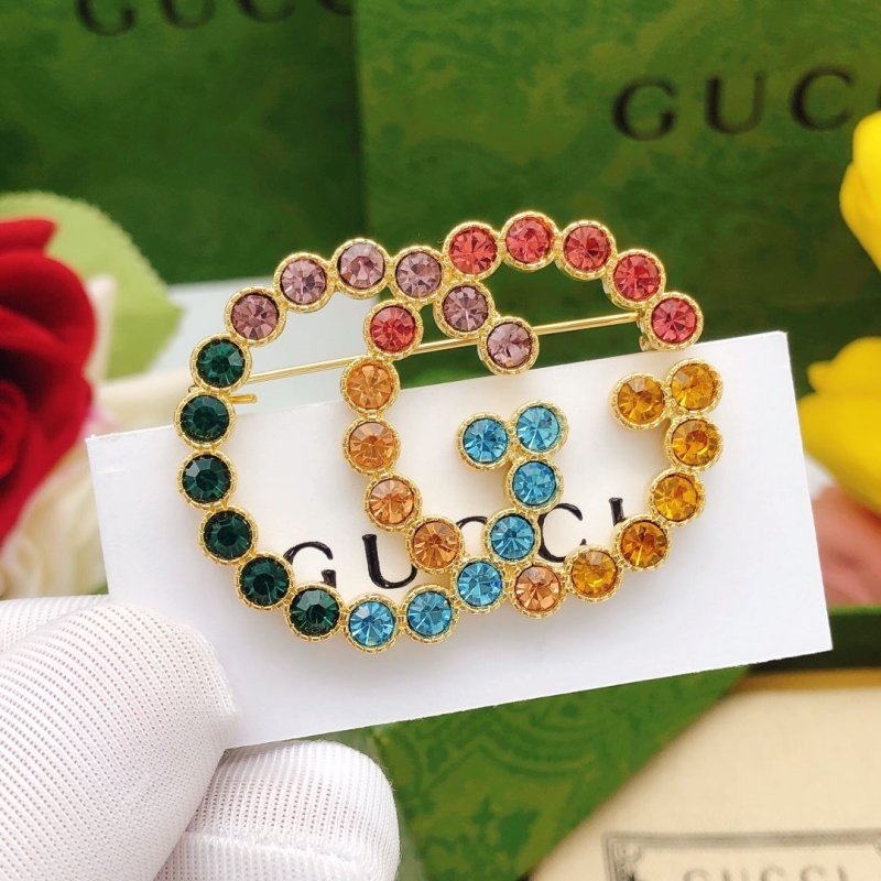 Gvc*1 brooches